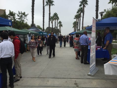 The booths of high schools presenting themselves It's like LA's palm tree boulevard, but with KNOWLEDGE