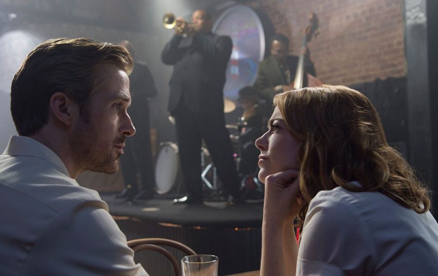 Sebastian (Oscar nominee Ryan Gosling), left, and Mia (Oscar nominee Emma Stone), right, converse with each other at an LA jazz spot - The Lighthouse Café - in Damien Chazelles mesmerizing musical film La La Land with the couple struggling to achieve their dreams in the City of Angels.