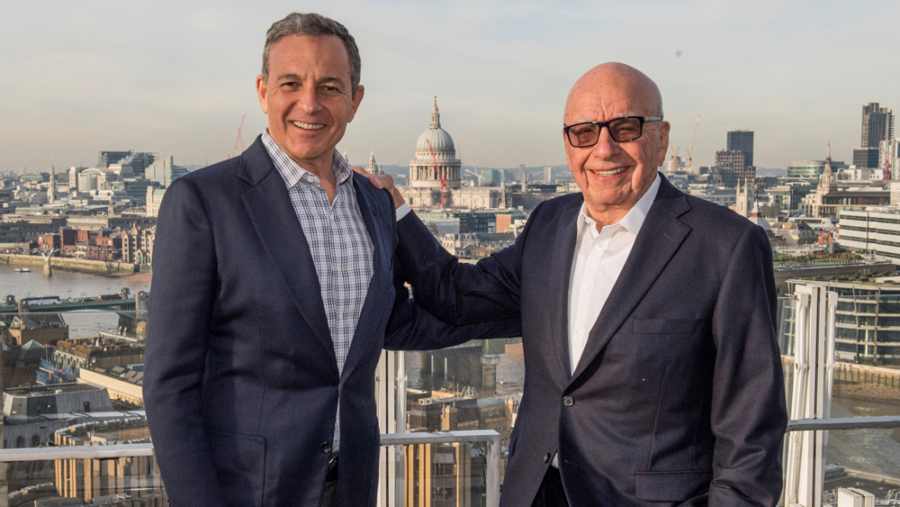 Disney CEO Bob Iger (left) and 21st Century Fox owner Rupert Murdoch (right) appear together after making a deal in which Disney will attain most assets of Murdochs company. 