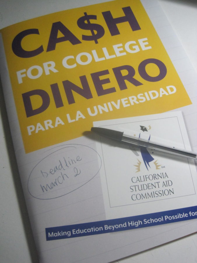 Morris and the counselors greeted people who joined them in their Cash for College workshop by giving them these folders which contained an informational magazine about FAFSA and the various ways in which students could pay for college. 
