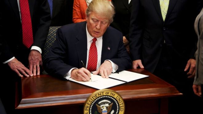 Trump signs law making it easier for people with mental illness to buy guns