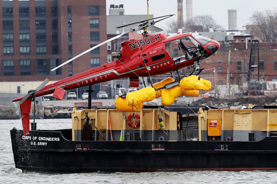 Helicopter crashes into New York river