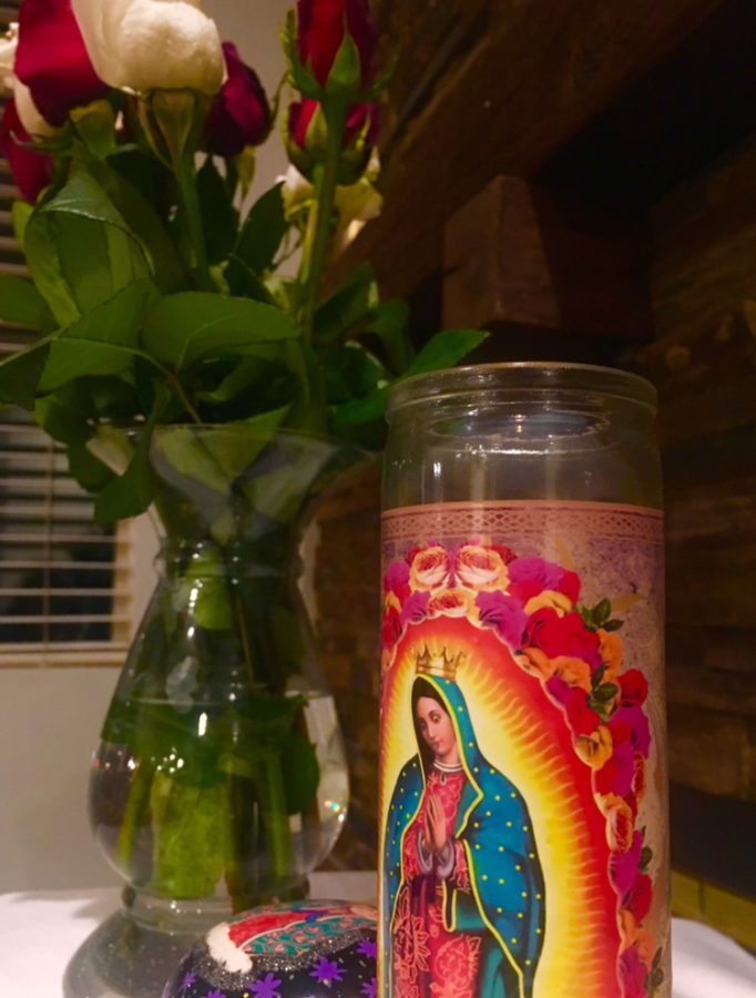 This type of candle is known as a veladora in Spanish, used for religious purposes.