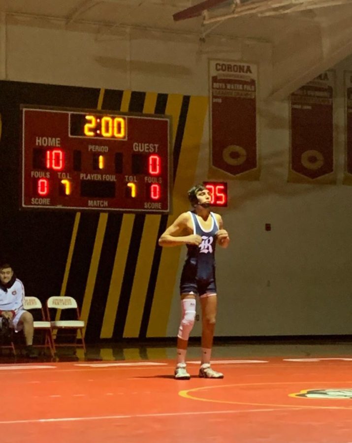 David Saenz, a sophomore varsity wrestler, in the first dual of the season against Corona