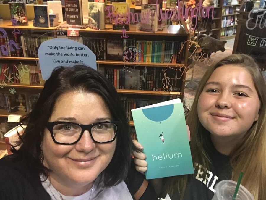 My mother and I at a poetry reading for Rudy Francisco after I purchased his book, Helium. 