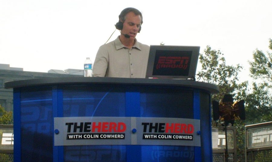 Colin Cowherd hosting a live broadcast of "The Herd with Colin Cowherd" at the University of Iowa in 2010.