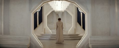 Mon Mothma standing alone in her Coruscanti residence after her cousin Vel leaves