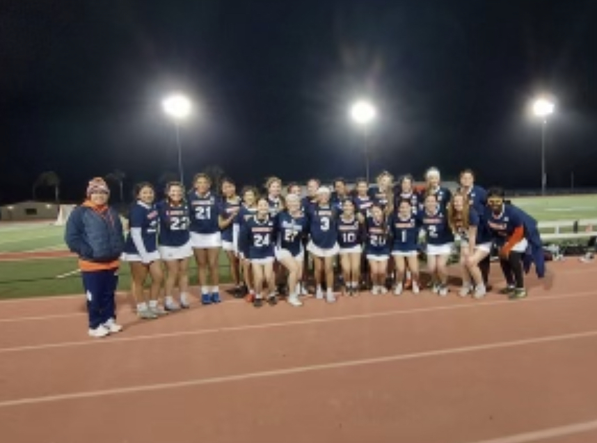 The Girls Lacrosse Varsity Team at their game against Heritage High School!