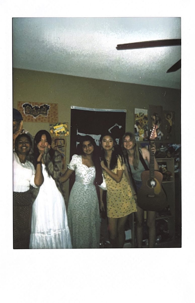 Students+pose+for+a+polaroid+