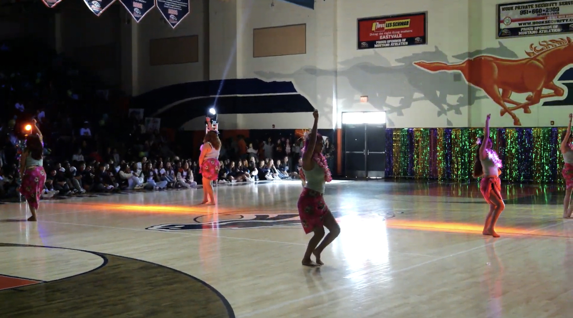 Hula dancers ending their dance