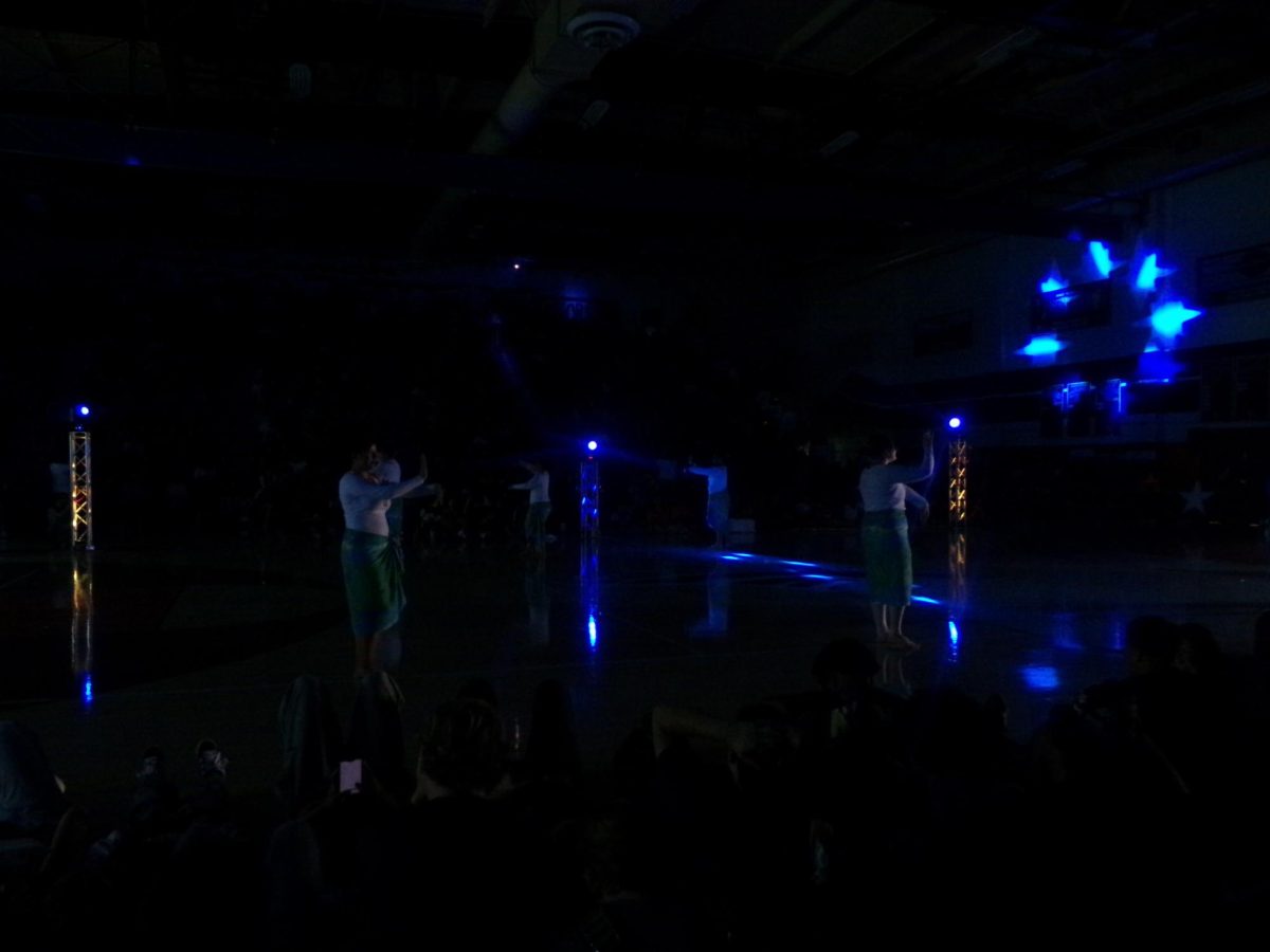 Polynesian Club's girls dance for the pep rally