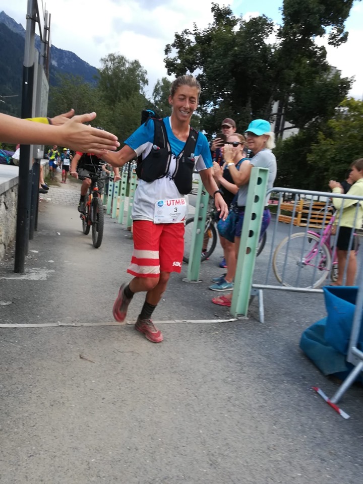 Courtney Dauwalter finishing Ultra-Trail du Mont-Blanc in 2019