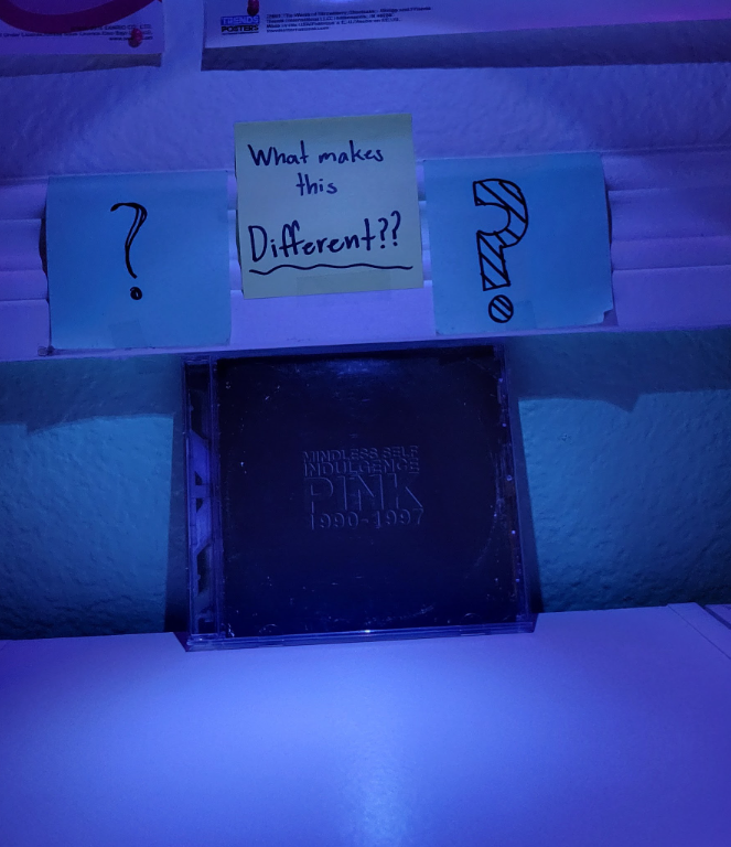 The PINK CD with some questioning remarks above it.