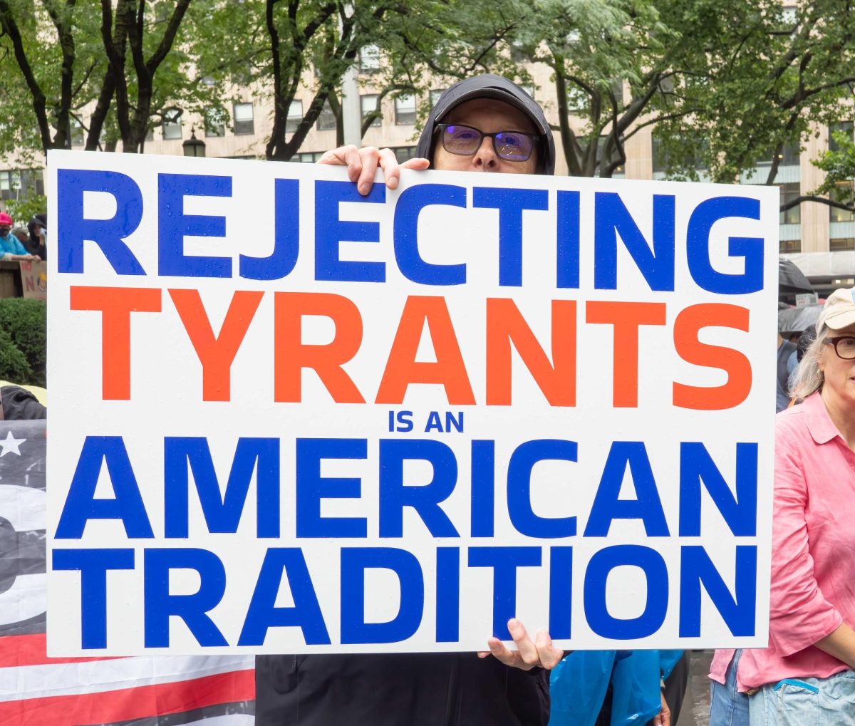 Protester with anti Tyrant Poster