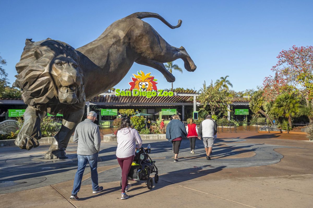 A view of the entrance of the San Diego Zoo, with the famous sculpture of Rex's Roar.